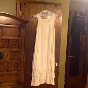 Women’s Dress, white, cotton, with fringe on overlay skirt.. Slip hangs below.